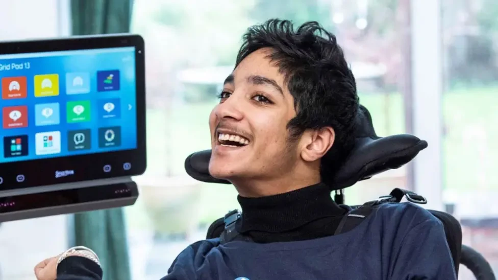 Person using eye gaze assistive technology to communicate